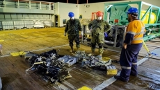 Drone retrieves human remains, pieces of navy helicopter that crashed off Greece